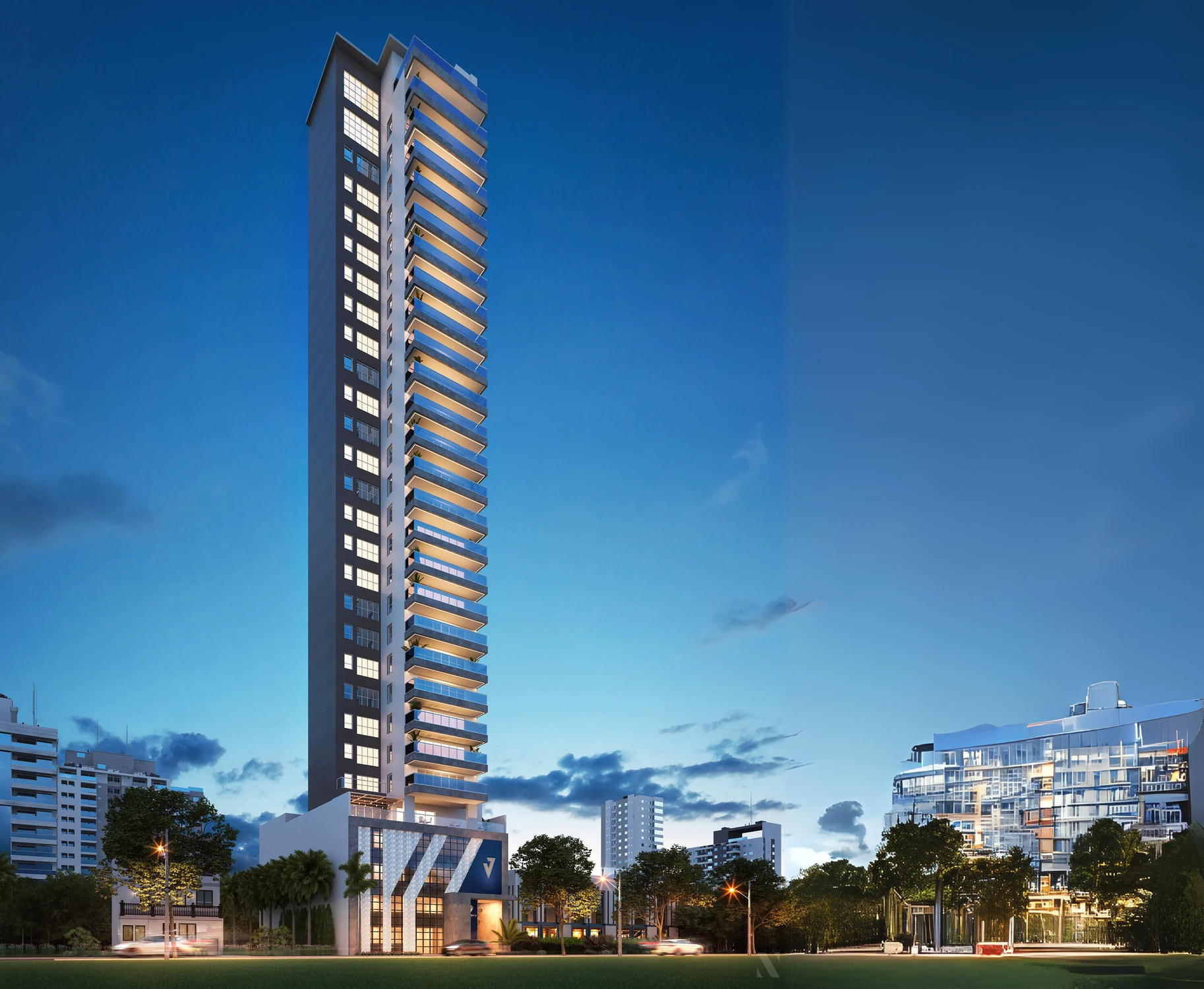 Perspectiva noturna do Evidence Residencial, com torre esbelta e iluminação quente